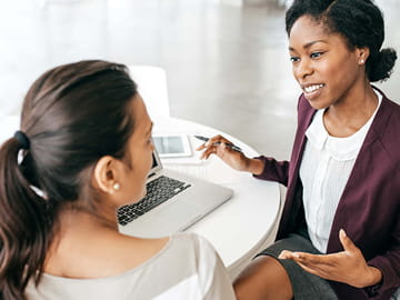 two women meeting